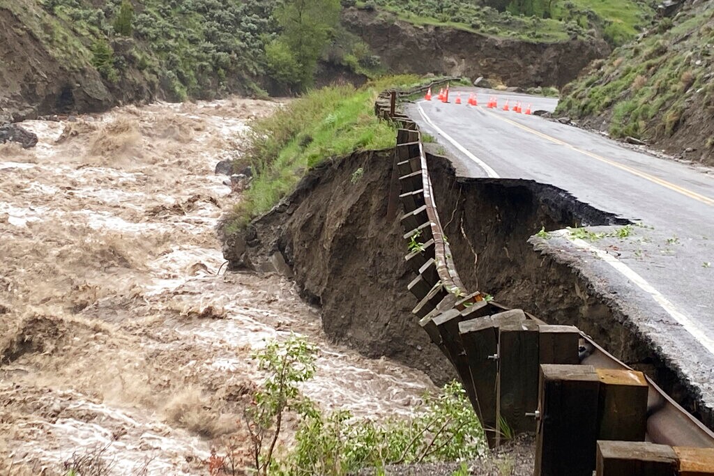 (National Park Service via AP) High water in the Gardiner River along the North Entrance to Yellowstone National Park in Montana washed out part of a road on Monday, June 13, 2022.
