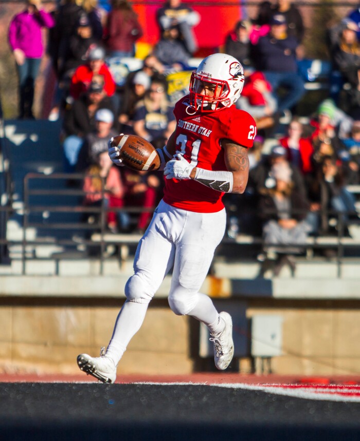 Southern Utah running back Jay Green Jr. scores a touchdown against Northern Arizona during an NCAA college football game Saturday, Nov. 18, 2017, in Cedar City, Utah. Southern Utah defeated Northern Arizona 48-20 to claim a share of the Big Sky Conference title. (Jordan Allred/The Spectrum via AP)