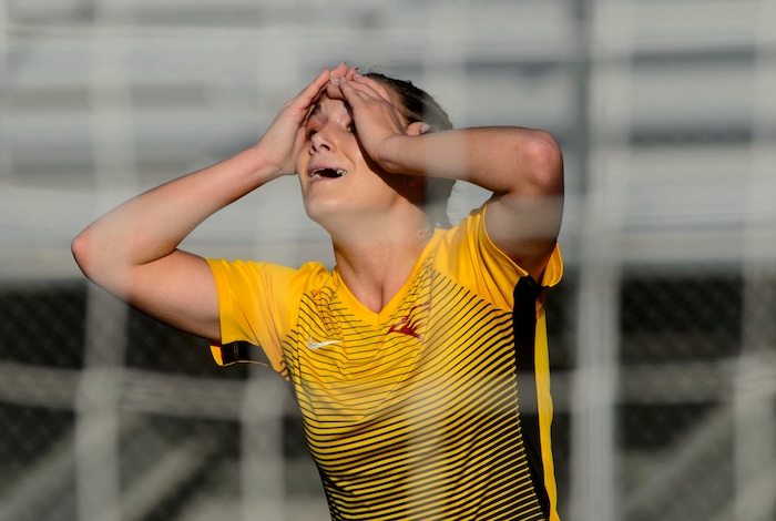 (Steve Griffin | The Salt Lake Tribune) Maple Mountain's Chloe Martin holds her head in her hands after her goal was waived off due to an offsides call during the 5A semifinal girl's soccer match against East at Juan Diego High School in Draper Tuesday October 17, 2017.