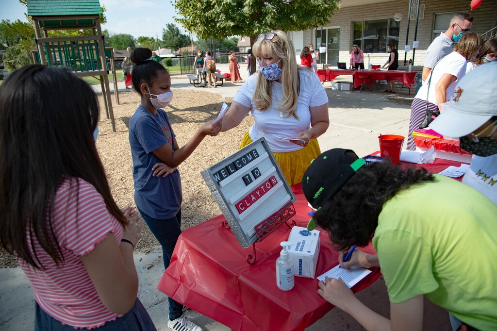 (Francisco Kjolseth  |  Tribune file photo) The Salt Lake City School District sends staff to the Park Place Apartments on Tuesday, Aug. 25, 2020, to help about 60 students who still needed to register for the fall.