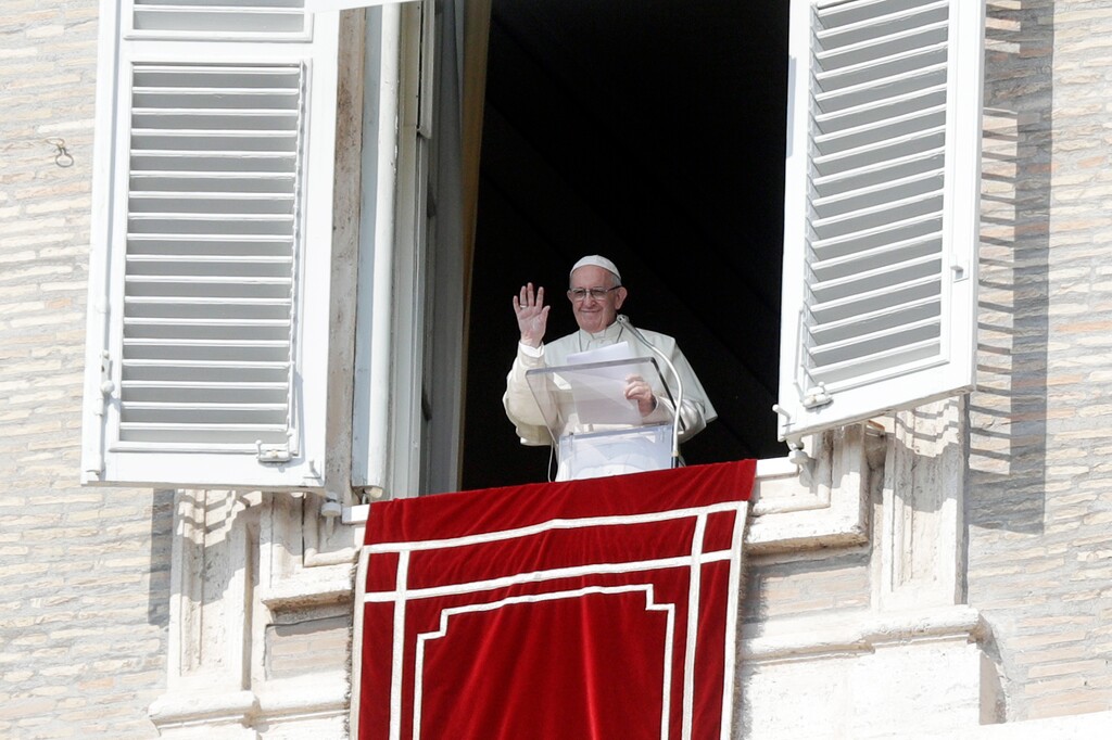 (AP Photo/Gregorio Borgia) Pope Francis waves to faithful at the end of the Angelus prayer he delivered in St. Peter's Square at the Vatican, Sunday, Oct. 21, 2018.
