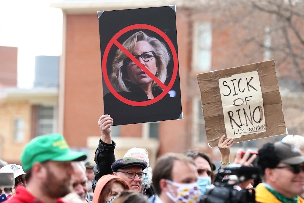(Michael Cummo/The Wyoming Tribune Eagle via AP)

Protesters hold anti-U.S. Rep. Liz Cheney, R-Wyo., signs during a rally Thursday, Jan. 28, 2021, outside the Wyoming State Capitol in Cheyenne.