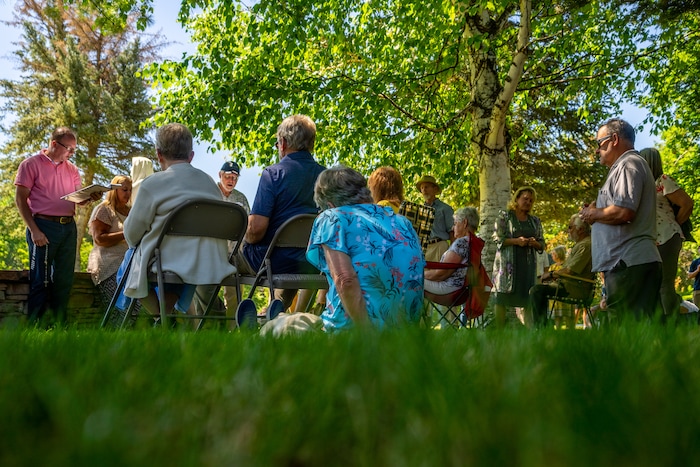(Trent Nelson  |  The Salt Lake Tribune) Acolyte Chris Kennedy, at left, leads Rosary prayers at the Abbey of the Holy Trinity in Huntsville during a gathering to celebrate 75 years since its founding on Sunday, July 10, 2022.
