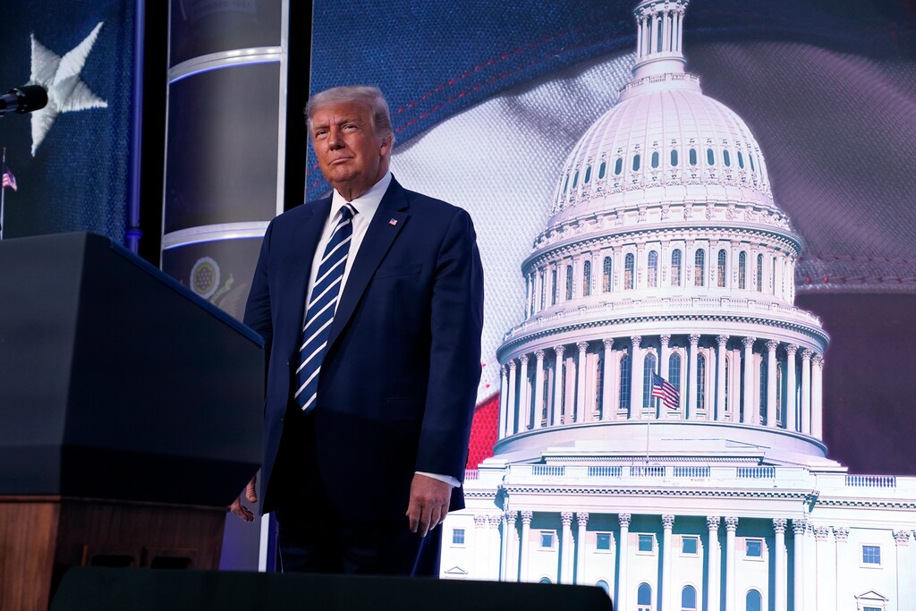 (Evan Vucci | AP file photo)  President Donald Trump stands on stage during the 2020 Council for National Policy Meeting, Friday, Aug. 21, 2020, in Arlington, Va.