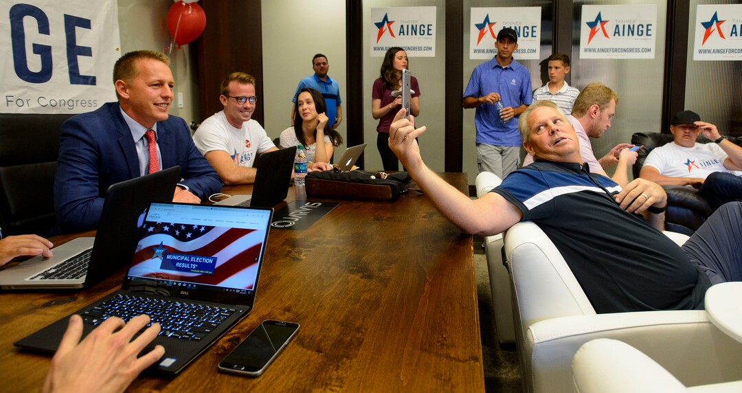 (Steve Griffin  |  The Salt Lake Tribune)  A he waits for primary results 3rd Congressional District candidateTanner Ainge talks with his sister,  Ashley Lesueur, as his father Danny Ainge holds the phone at his  election night headquarters in Orem Tuesday August 15, 2017.