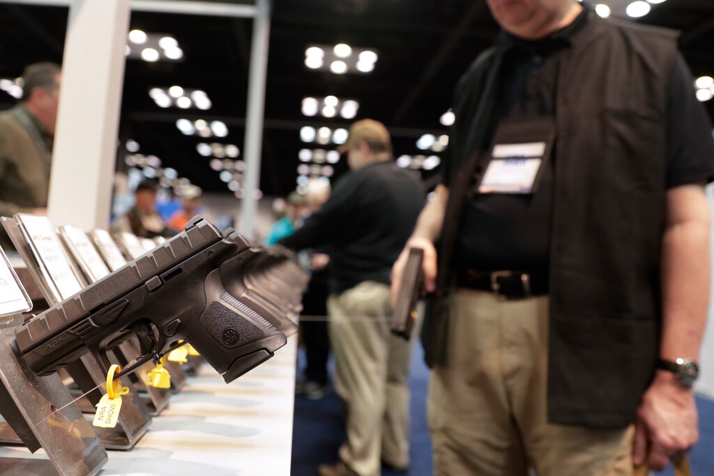 (Michael Conroy | AP photo)

In this April 27, 2019, file photo, a gun enthusiast looks over the display of pistols in the exhibition hall at the National Rifle Association annual meeting in Indianapolis.