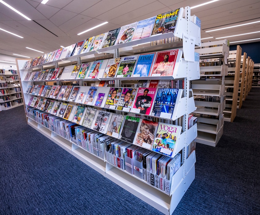 (Rick Egan | The Salt Lake Tribune)  The periodical section of the Granite Library on 3300 South, South Salt Lake, in June 2022. The Utah House Education Committee passed a bill that would require public library systems to require criminal background checks for their employees, or risk losing state funding. Many systems in Utah already have policies to require such checks.