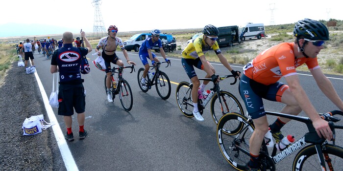 Al Hartmann | The Salt Lake Tribune
Riders in the 4th stage of the Tour of Utah enter the feed zone in Rush Valley, the halfway point in the race. It's controlled mayhem as riders grab a lunch sack and drinks on the fly from their support team. Stage 4 started in South Jordan went west into the hot ,dry west desert and finished back in South Jordan 123 miles later.