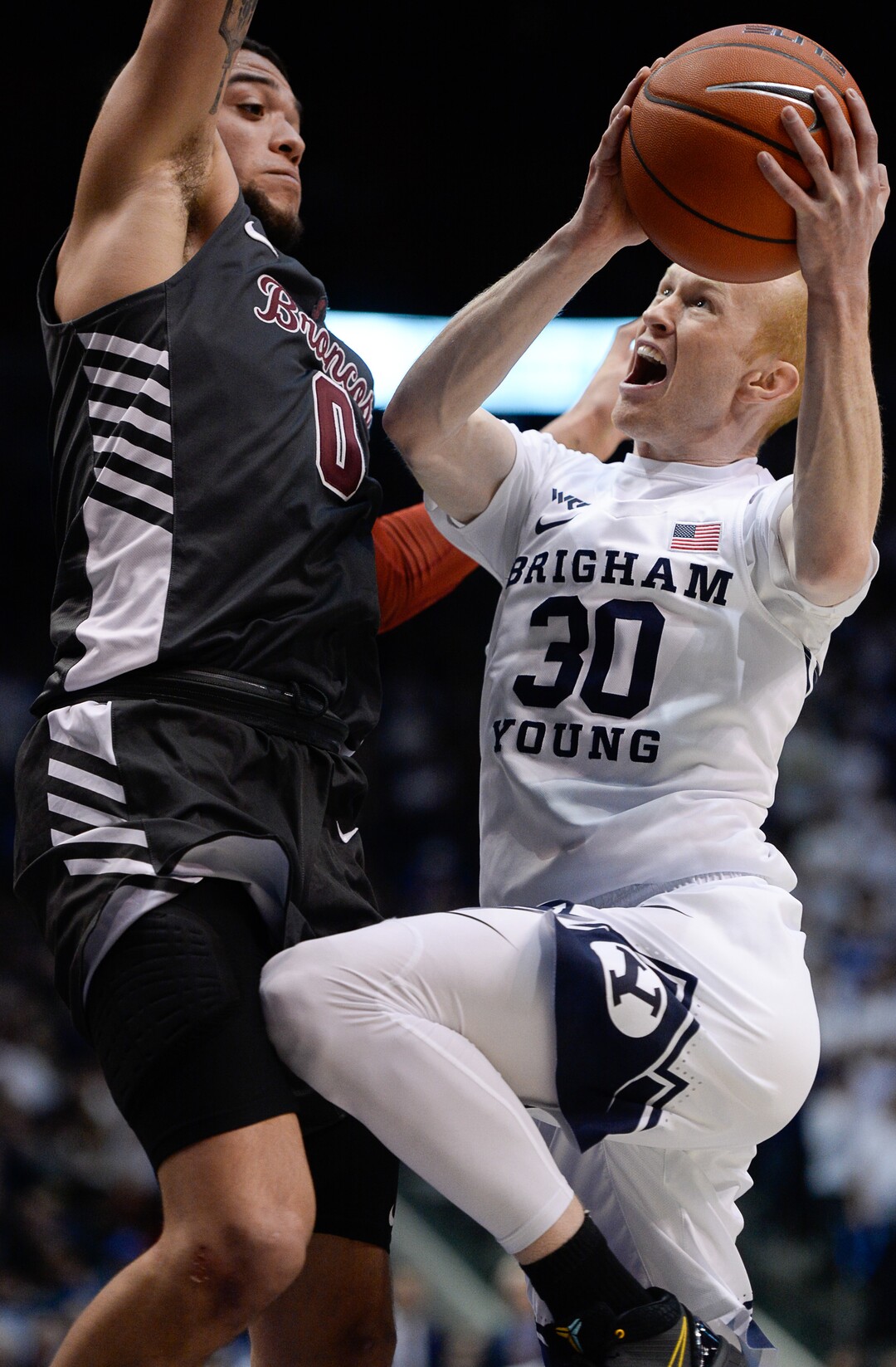 (Francisco Kjolseth  |  The Salt Lake Tribune) Santa Clara Broncos forward DJ Mitchell (0) tries to slow Brigham Young Cougars guard TJ Haws (30) in the second half as the Brigham Young Cougars host the Santa Clara Broncos at the Marriott Center in Provo, Thursday, Feb. 20, 2020. BYU won 85-75.