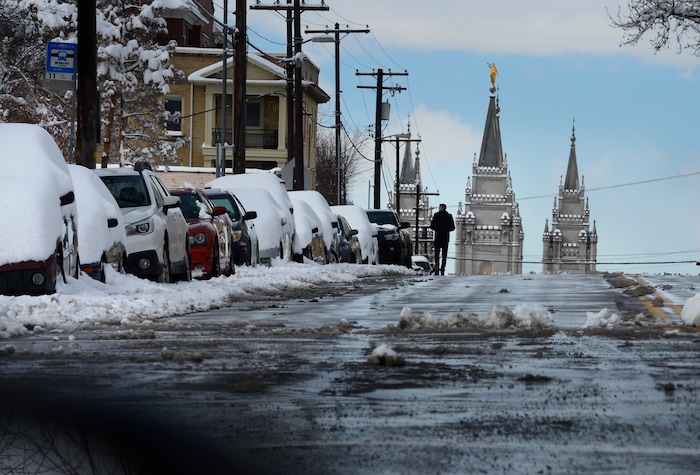 Scott Sommerdorf | The Salt Lake TribuneA man walks westbound on 1st Avenue in Salt Lake City after an overnight snowstorm, Sunday, March 4, 2018.