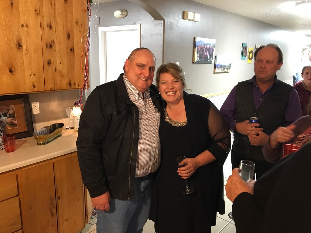 JVar Dutson, left, and Donia Jessop celebrate after being ahead in early returns in the Nov. 7, 2017, Hildale municipal election. Dutson ran for City Council and Jessop ran for mayor. Garth Jessop, right, looks on. Photo by Nate Carlisle/The Salt Lake Tribune
