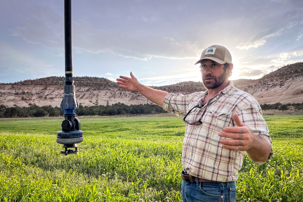 (David Condos | KUER) Andy Rice explains how the irrigation tech upgrades at his ranch have helped save water, Aug. 21, 2024.