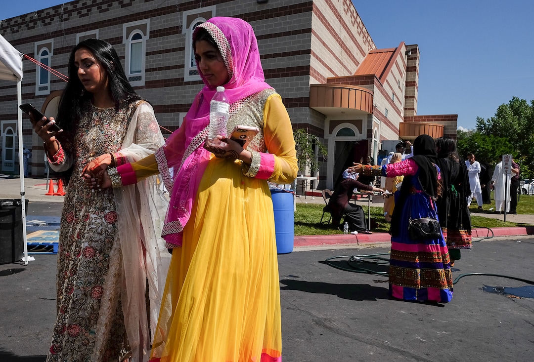 (Francisco Kjolseth  |  The Salt Lake Tribune)  Members of the Khadeeja Islamic Center in West Valley City mark the end of Ramadan, a 30 day period of fasting and spiritual growth, dressed in colorful attire in celebration on Wed. June 5, 2019.