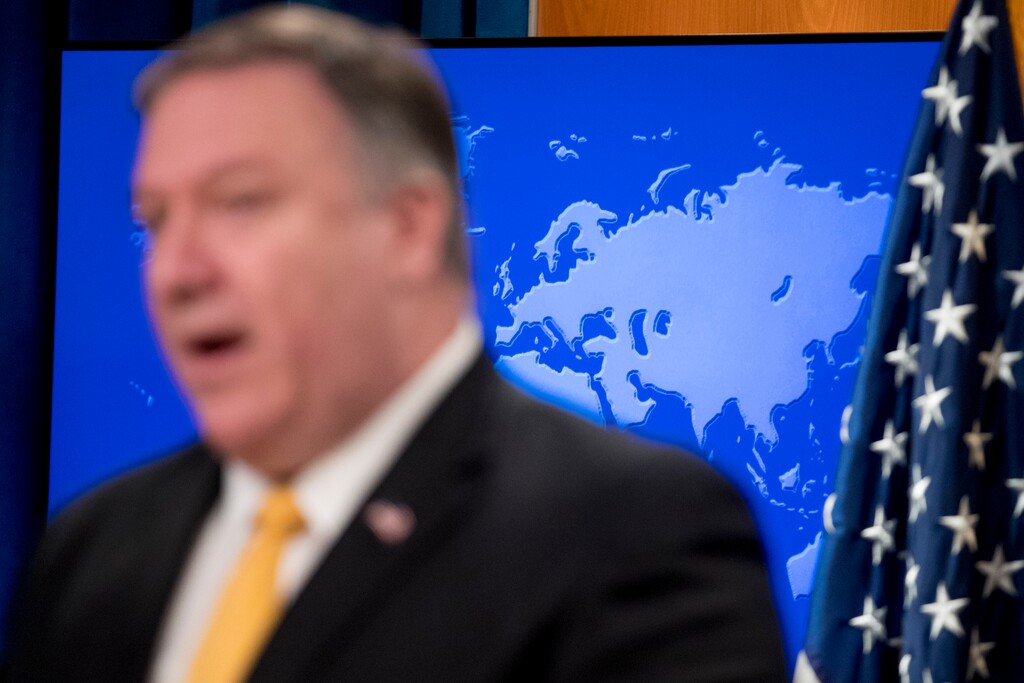 (Andrew Harnik | AP file photo) A map of the world is displayed behind Secretary of State Mike Pompeo speaks at a news conference at the State Department in Washington, Feb. 1, 2019.