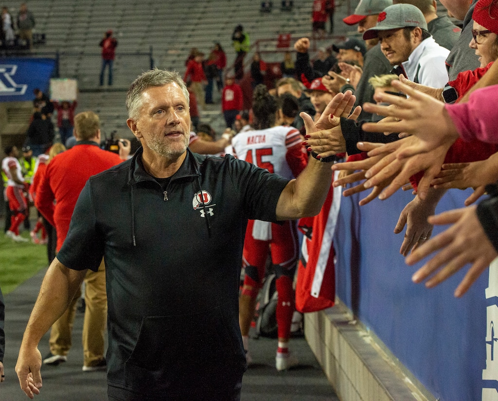 (Rick Egan  |  The Salt Lake Tribune)      Utah Utes head coach Kyle Whittingham greets the fans after defeating the Wildcats, 35-7, in PAC-12 action between the Utah Utes and the Arizona Wildcats in Tucson, Saturday, Nov. 23, 2019.