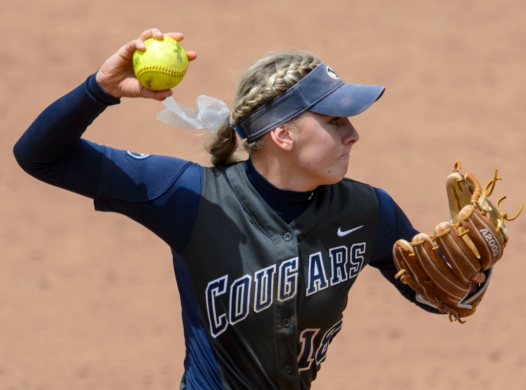 Steve Griffin | The Salt Lake Tribune | After an outstanding four-year career as a BYU softball player, Caitlyn Alldredge has joined the BYU women's basketball team and quickly become one of the best defenders on the team.
BYU's Caitlyn Larsen Alldredge fires to first for an out after scooping up a bunt during the NCAA softball regional against Utah at Dumke Family Field at the U. of U. in Salt Lake City Friday May 19, 2017.