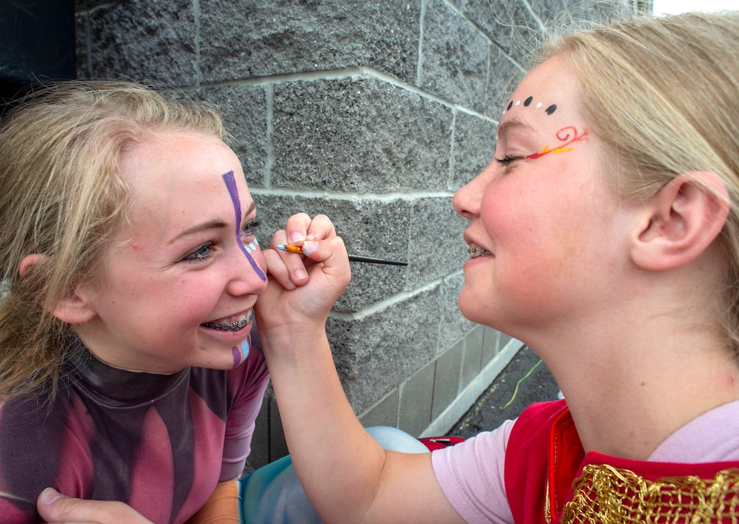 (Rick Egan  |  The Salt Lake Tribune)    Debbie Wilsen 12, wicked laminate stunter has her face painted by Hailey Spencer 12, a  wicked Nephite dancer, before the Mormon Miracle Pageant Wednesday, June 12, 2019.  The final run for the pageant continues through Saturday, June 22.