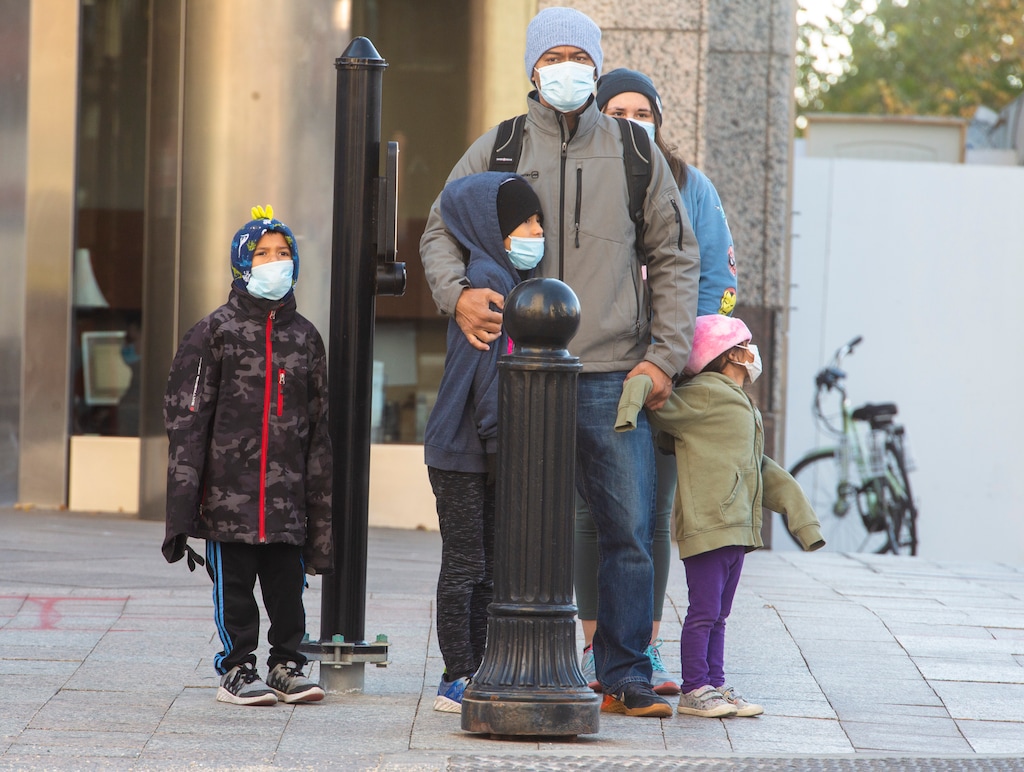 (Rick Egan  |  The Salt Lake Tribune)     Downtown shoppers wear masks as they wait for the light to change on Main Street in Salt Lake City, Monday, Oct. 26, 2020.