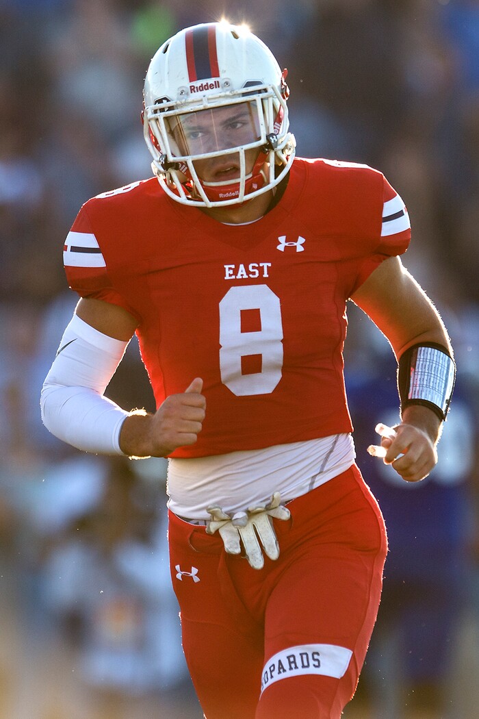 (Chris Detrick  |  The Salt Lake Tribune)  East's Ben Ford (8) runs off of the field during the game at Bingham High School Friday, August 25, 2017. Bingham is winning the game 24-17 at halftime. 