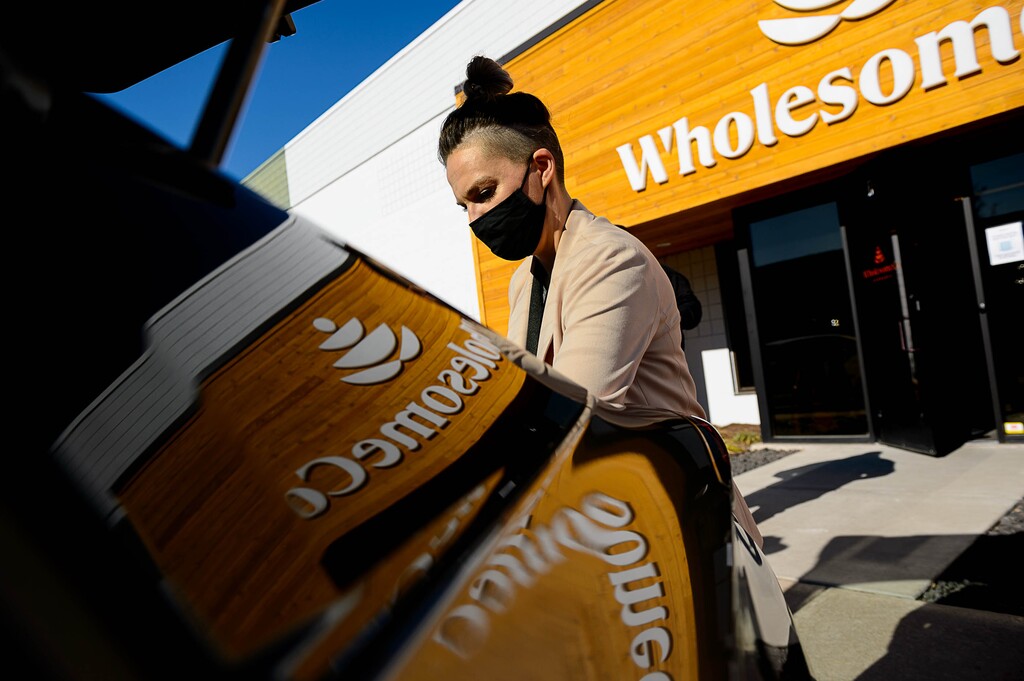 (Trent Nelson  |  The Salt Lake Tribune) Sarah Stokes prepares deliveries of medical cannabis for customers of WholesomeCo, in Bountiful on Wednesday, Jan. 20, 2021.