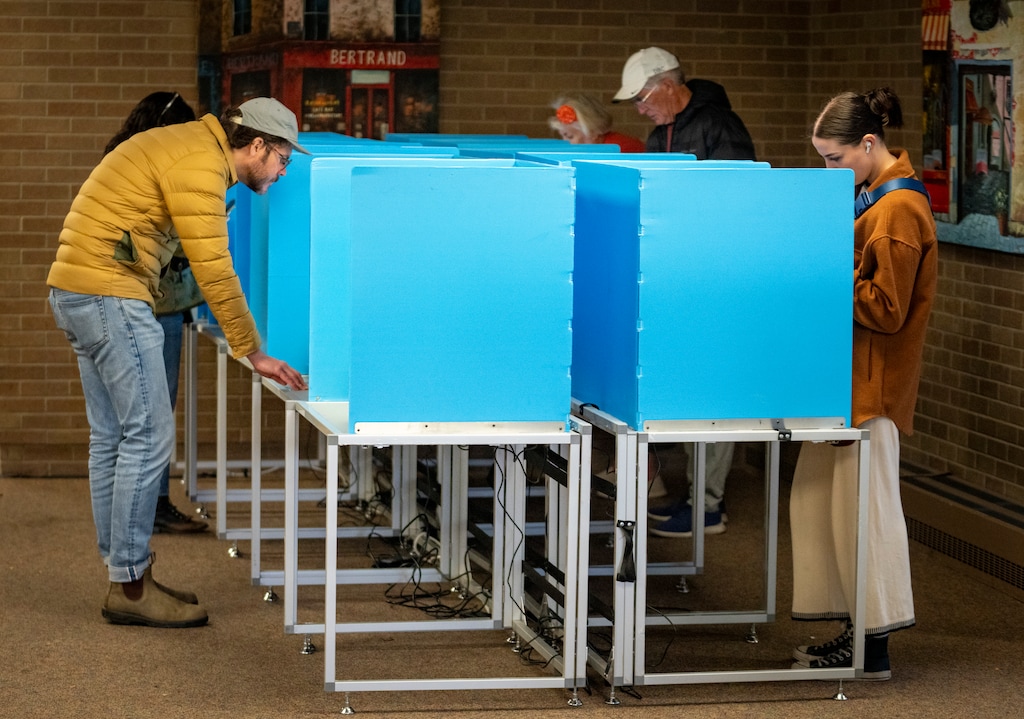(Rick Egan | The Salt Lake Tribune)  Early voters cast their ballots at Salt Lake County Government Center, on Wednesday, Oct. 30, 2024.