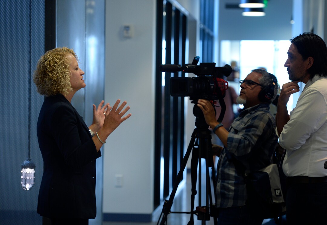 (Scott Sommerdorf   |  The Salt Lake Tribune)   Salt Lake City Mayor Jackie Biskupski does a television interview after it was announced that Gail Miller and the Miller family had made a challenge grant of up to 10 million dollars to fund future homeless programs and services at the VOA, Utah Homeless Youth Resource Center, Thursday, August 17, 2017. 