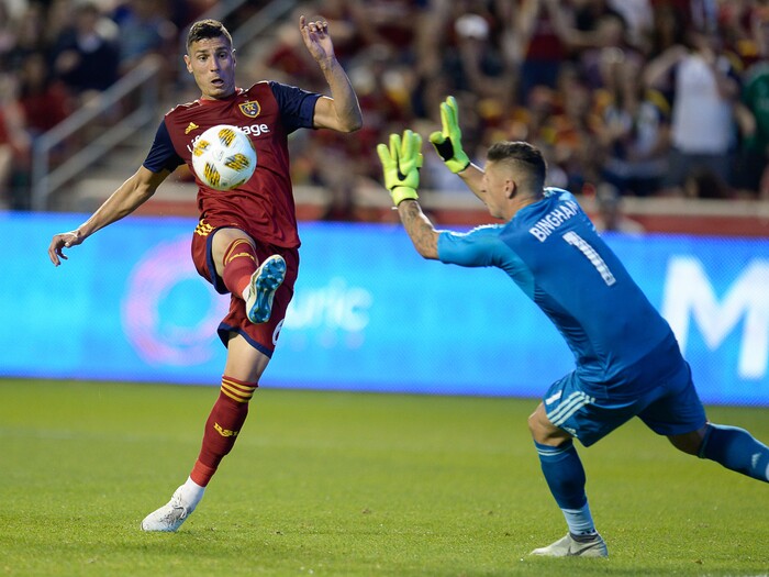 (Francisco Kjolseth  |  The Salt Lake Tribune)  Real Salt Lake midfielder Damir Kreilach (6) gets the ball over Los Angeles Galaxy goalkeeper David Bingham (1) before heading it in for his first goal during the first half of the MLS soccer match Saturday, Sept. 1, 2018, in Sandy at Rio Tinto Stadium.