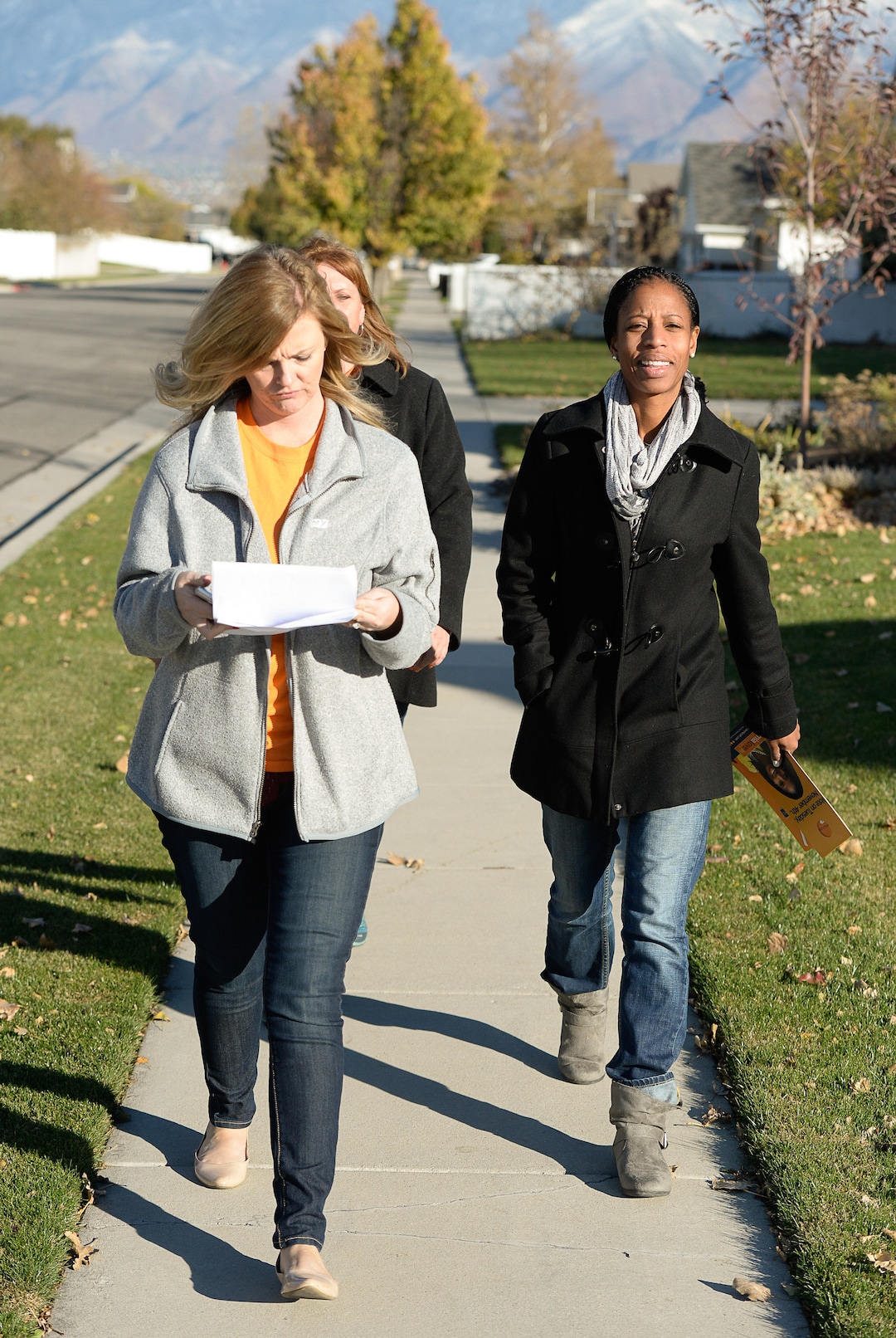 (Francisco Kjolseth | The Salt Lake Tribune) Republican candidate for Congress Mia Love canvasses neighborhoods in Riverton alongside volunteer Evelyn Everton, left, and operations director Laurel Price, center, Nov. 4, 2014.