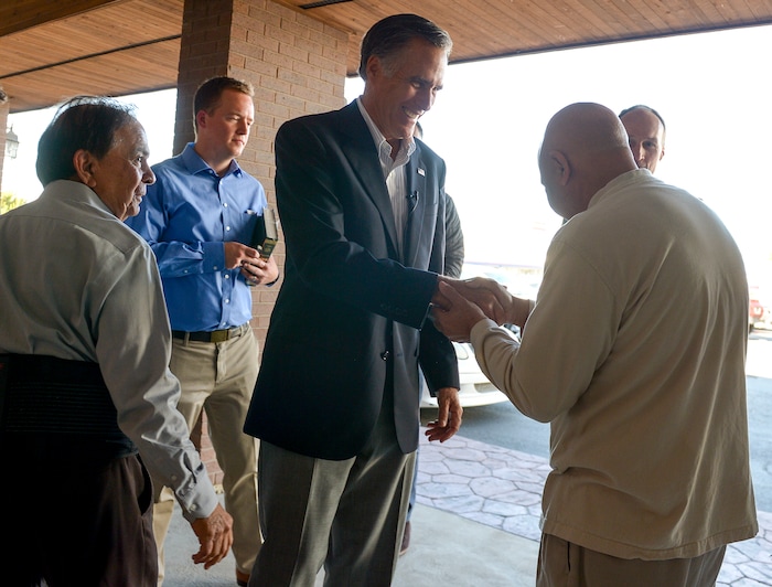 Leah Hogsten  |  The Salt Lake Tribune  Republican U.S. Senate candidate Mitt Romney is thanked by members of the Utah Islamic Center, Oct. 26, 2018 after speaking to the Muslim community prior to Friday special prayers.