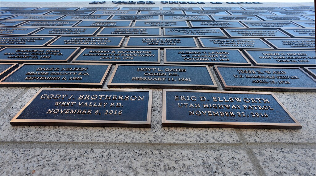 Scott Sommerdorf | The Salt Lake Tribune
The names of Cody J. Brotherson, and Eric D. Ellsworth were affixed to the Utah Law Enforcement Memorial wall, Thursday, May 4, 2017 during the annual Utah Law Enforcement Memorial ceremony at the State Capitol.