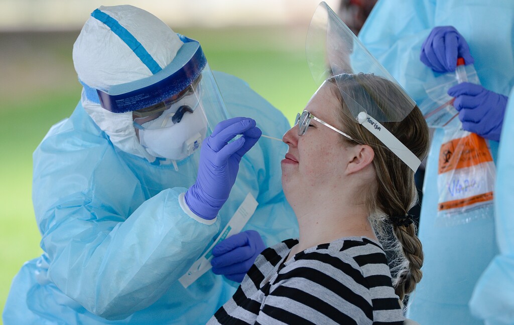 (Francisco Kjolseth | The Salt Lake Tribune) Marisa Devitry, director of the West Jordan Care Center, grimaces as the Utah Department of Health tests staff for the coronavirus on Thursday, May 21, 2020. The testing is part of a plan to test staff at all long-term care facilities, with centers for memory patients and the intellectually disabled receiving priority.