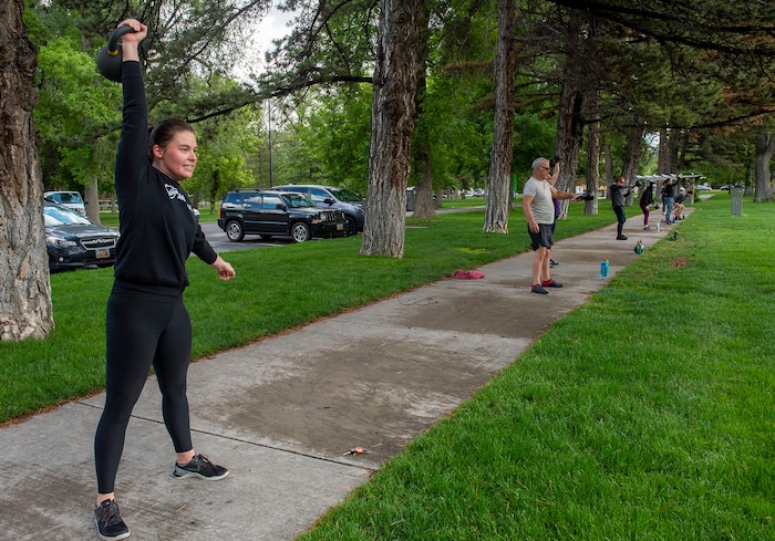 (Rick Egan  |  The Salt Lake Tribune)     Alexa Wrench works out with a fitness class at Liberty Park, Saturday, May 23, 2020.