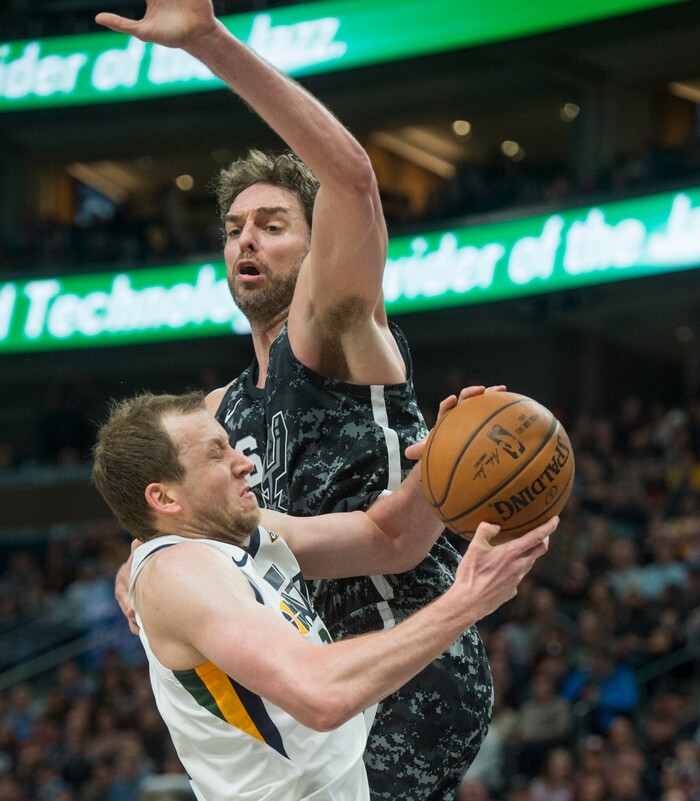 (Rick Egan  |  The Salt Lake Tribune)   San Antonio Spurs center Pau Gasol (16) stops Utah Jazz forward Joe Ingles (2) from scoring with a hard foul, in NBA action, in Salt Lake City, Monday, February 12, 2018.
