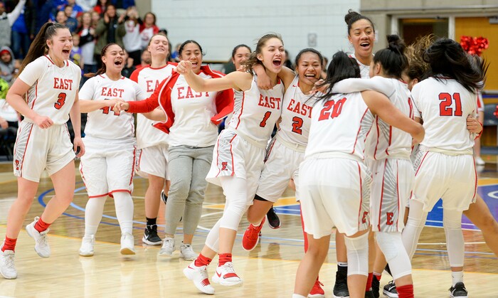 (Leah Hogsten  |  The Salt Lake Tribune) East celebrates the win.  East defeated Timpview 68-48 to win the the 5A High School Girls' Basketball Tournament title at SLCC in Taylorsville, Saturday, Feb. 24, 2018. 