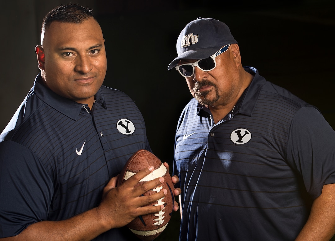 (Leah Hogsten  |  The Salt Lake Tribune) Brigham Young University head coach Kalani Sitake and his father Tom Sitake, Wednesday, August 2, 2017 during BYU's annual football photo day in the Indoor Practice Facility (IPF) on campus.