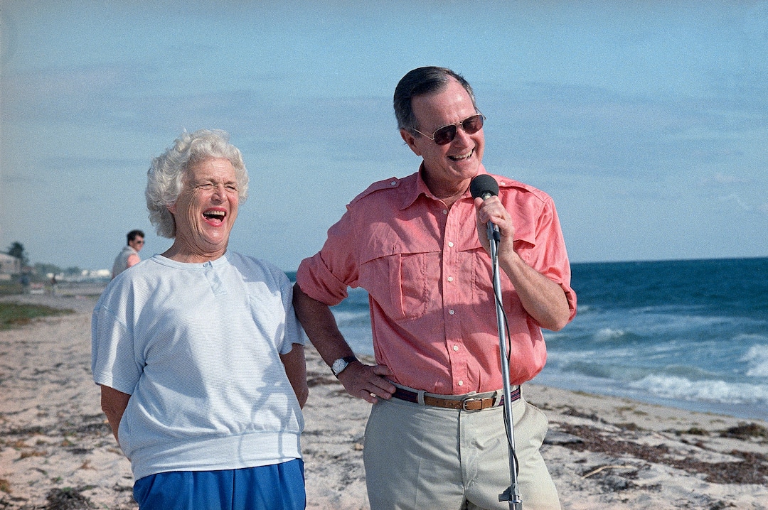 FILE - In this Nov. 14, 1998, file photo, President-elect George H.W. Bush and his wife, Barbara, are shown during a morning beachfront news conference in Gulf Stream, Fla. A family spokesman said Tuesday, April 17, 2018, that former first lady Barbara Bush has died at the age of 92. (AP Photo/Kathy Willens, File)