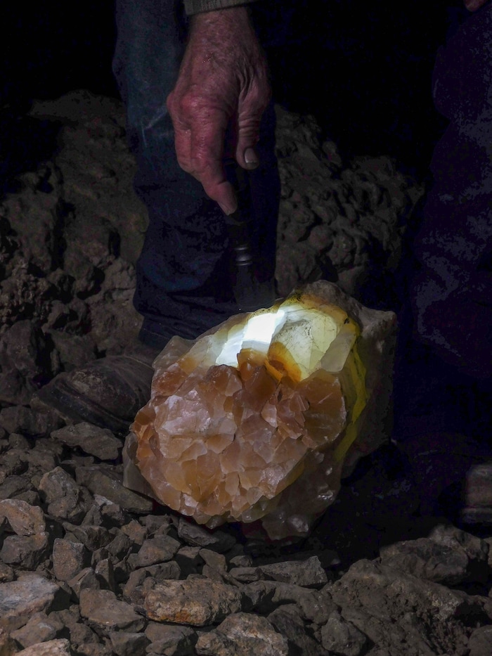 Erin Alberty  |  The Salt Lake TribuneJerald Bates' flashlight illuminates a translucent calcite formation in Crystal Ball Cave during a tour Feb. 20, 2017 in Gandy, Utah.