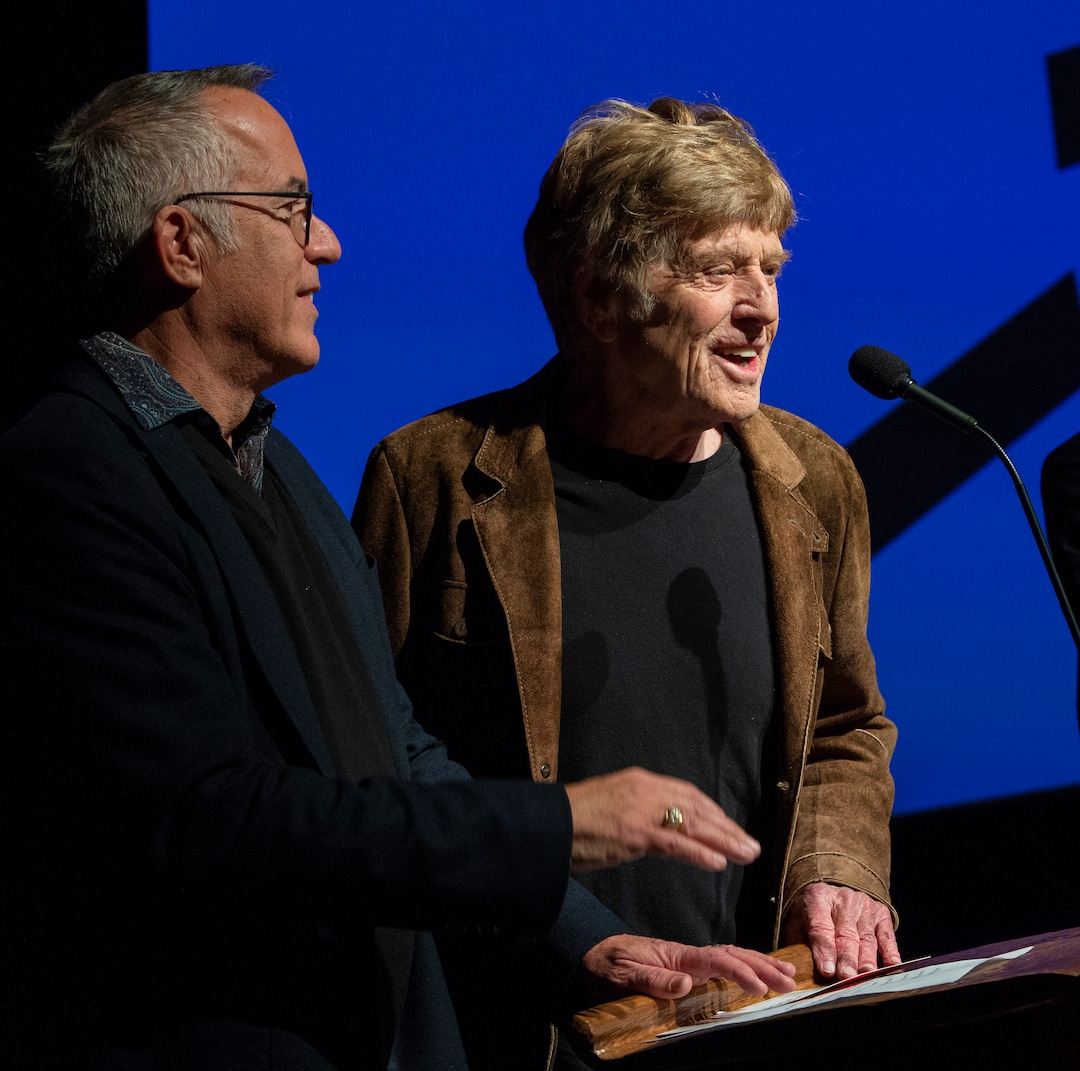 (Rick Egan  |  The Salt Lake Tribune)     Sundance Film Festival director John Cooper and Founder Robert Redford, welcome the crowd to Opening night film of the 2020 Sundance Film Festival, "Crip Camp", at the Eccles Theatre in Park City, Thursday, Jan. 23, 2020.