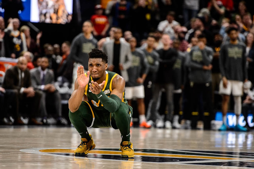 (Trent Nelson | The Salt Lake Tribune)  Utah Jazz guard Donovan Mitchell (45) celebrates as Utah Jazz forward Derrick Favors (15) makes a free throw in the final minute as the Utah Jazz host the Milwaukee Bucks, NBA basketball in Salt Lake City on Saturday March 2, 2019.