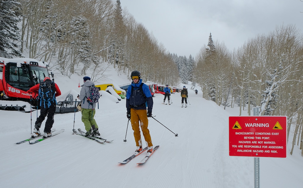 (Francisco Kjolseth | Tribune file photo) With all the resorts closed, skiers are taking advantage of new snowfall by turning to "uphill skiing," as crowds come and go along the Summer Road at Alta Ski Resort on Wednesday, March 25, 2020. So far Alta has allowed uphill traffic on some of its terrain but closed most areas on Wednesday for avalanche control. There has also has been a run on people buying backcountry gear, and skins for skis are nearly impossible to find.