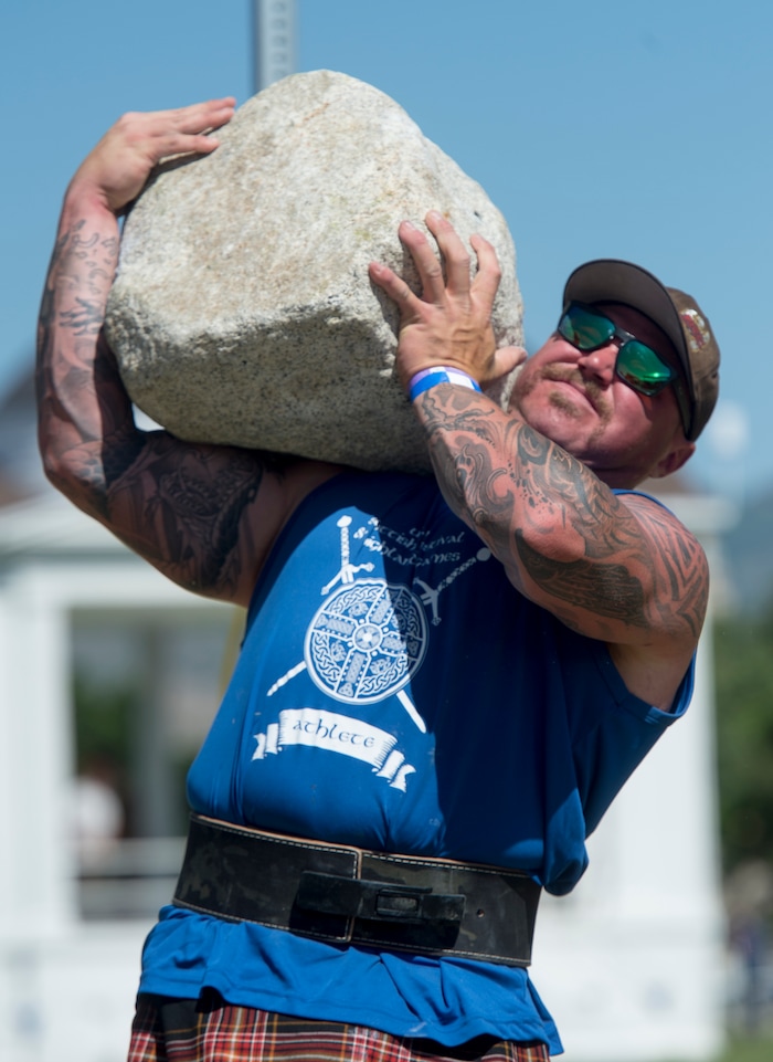 (Rick Egan  |  The Salt Lake Tribune)      John Anthoney competes in the stone lifting competition at the 44th annual Utah Scottish Festival and Highland Games at the Utah State Fairgrounds, Sunday, June 10, 2018.