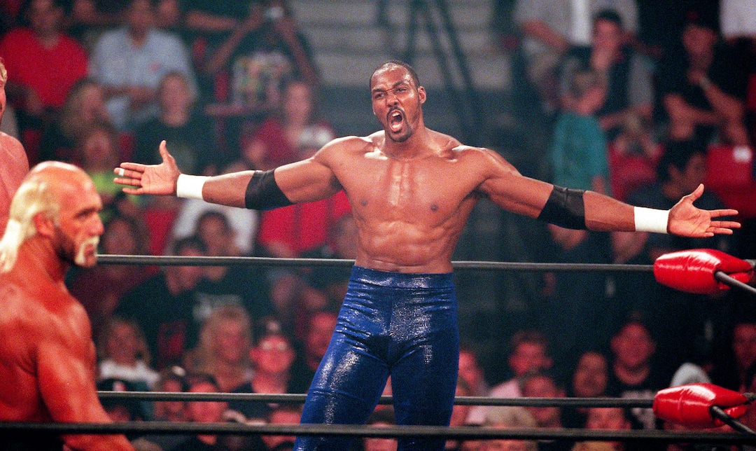 (Trent Nelson | The Salt Lake Tribune)  Karl Malone wrestles Hollywood Hulk Hogan at WCW's Bash at the Beach in San Diego. July 12, 1998.