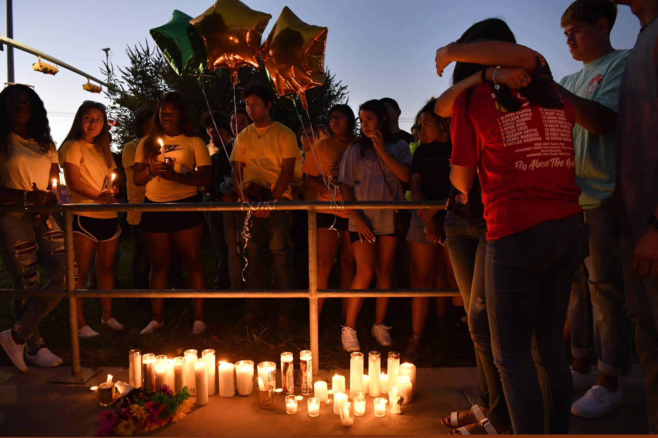 (Ronald W. Erdrich | The Abilene Reporter-News | AP) Odessa High School students and families remember their 15 year-old classmate Leilah Hernandez Monday Sept. 2, 2019 in Odessa, Texas. Leilah Hernandez, 15, was the youngest victim in the shooting spree that claimed multiple lives on Saturday. Leilah played basketball for Odessa High School, and her classmates have honored her by wearing her jersey number on their cheeks.
