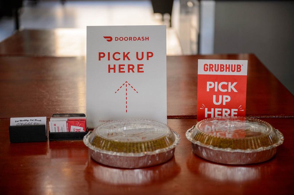 (Trent Nelson  |  The Salt Lake Tribune) Signs for DoorDash and Grubhub delivery drivers at O'Falafel in Salt Lake City on Friday, July 17, 2020.
