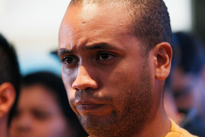 An opposition member reacts as the President of Venezuelan National Electoral Council Tibisay Lucena announces that the candidates for the ruling socialist party have won a majority of the 23 governors' offices up for grabs in Sunday's regional elections at opposition headquarters in Caracas, Venezuela, Oct 15, 2017. Pro-government electoral council president Tibisay Lucena says opposition candidates won just five of 22 races where the results are considered irreversible. (AP Photo/Ariana Cubillos)