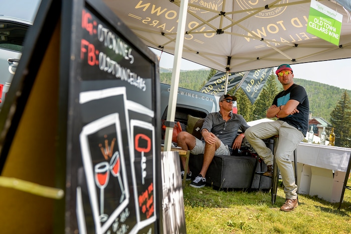 Leah Hogsten | The Salt Lake Tribune "The truth lies somewhere in the middle," said Old Town Cellars co-founder Stephen MacKay (right) talking to his friend David Campbell at the Old Town Cellars booth at the annual Taste of the Wasatch food and wine event Sunday, August 5, 2018 at Solitude. MacKay, other vendors and attendees were conflicted during the event after learning that tens of thousands of dollars in proceeds were funneled to the host organization and its leader instead of being donated to its non-profit charity, Utahns Against Hunger. "That's the whole reason why we're here to pour five grand worth of product for free," said MacKay.