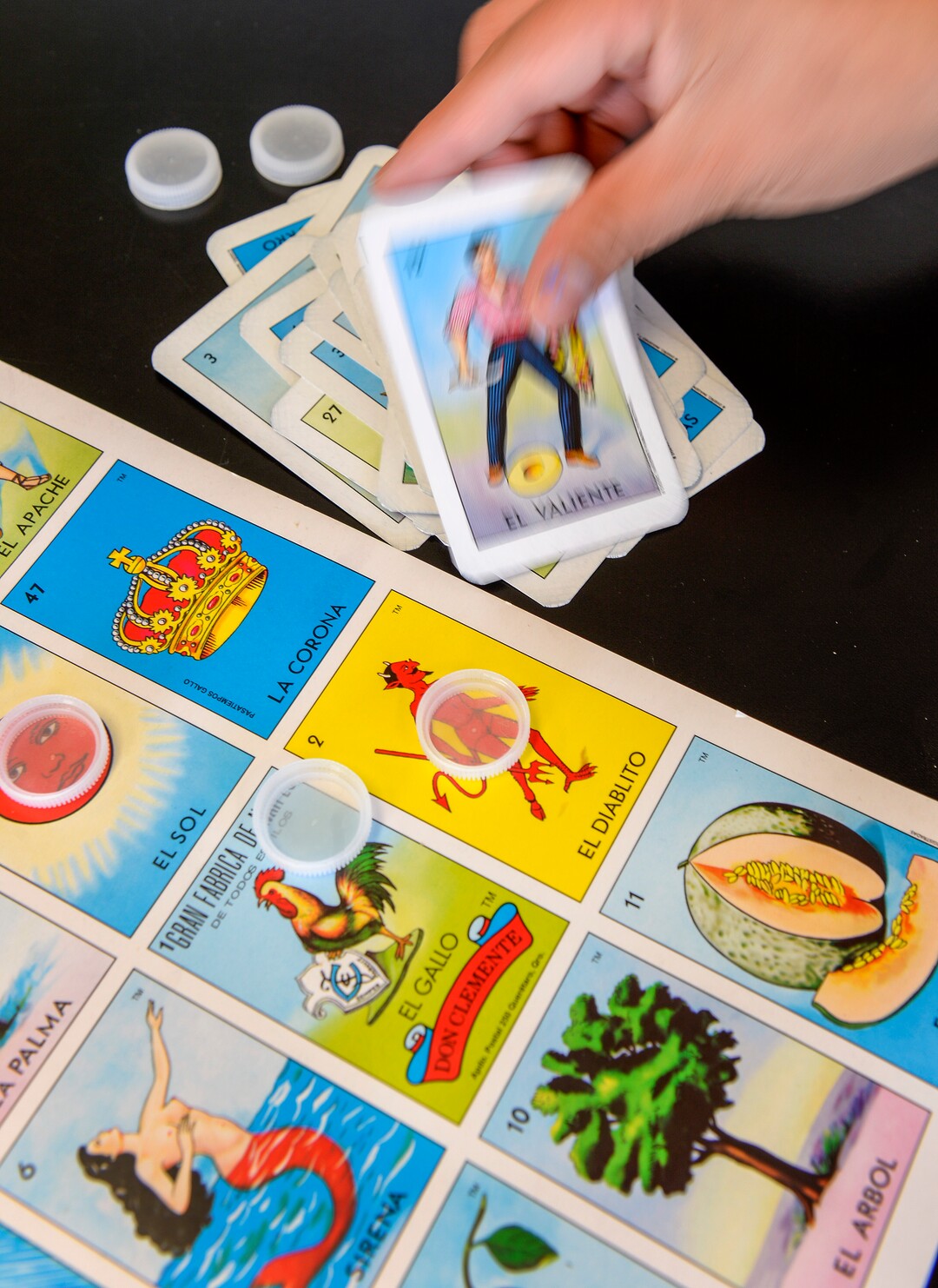 Leah Hogsten  |  The Salt Lake Tribune  Customers at Taqueria Los Lee can play the board game Loteria, or Mexican bingo while they wait for their food. The colorful bingo cards feature a variety of animals, mythical beings, fruits, trees, male and female characters, indigenous people and symbols.