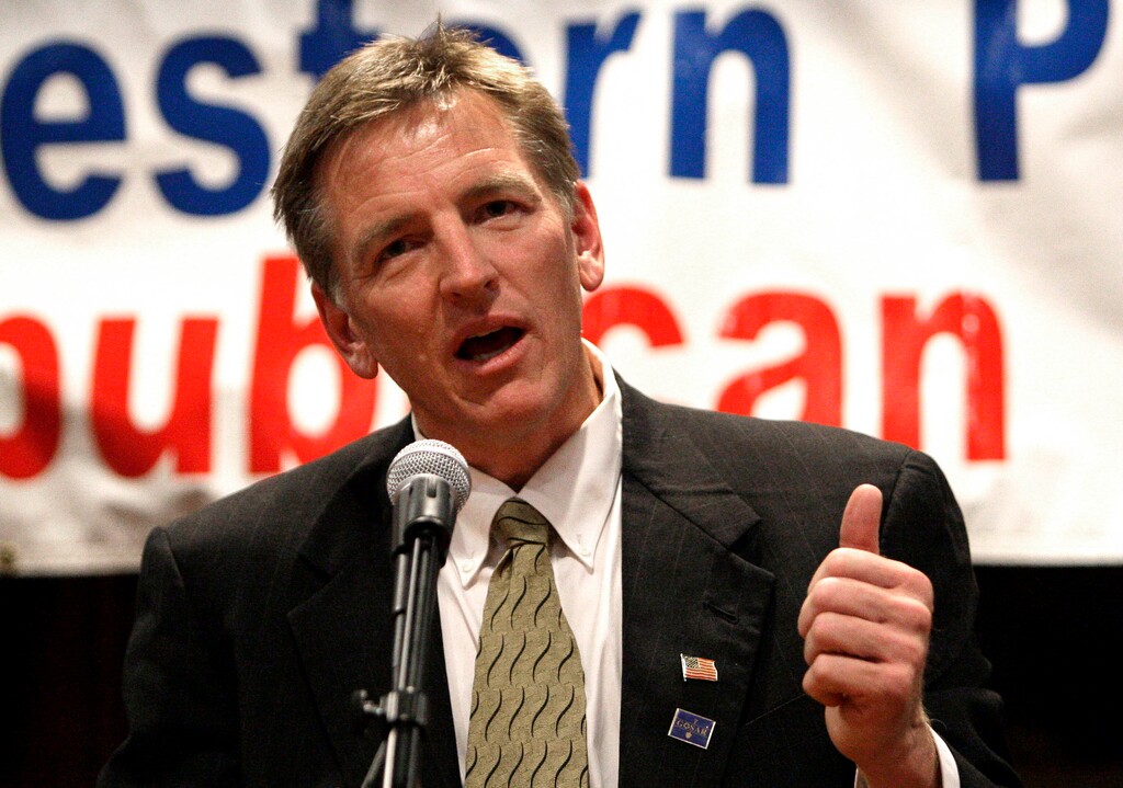 Arizona Republican Congressional District 1 candidate Paul Gosar talks to the crowd as he attends a Western Pinal Republican Club event where local Republicans and supporters gathered at Eva's Fine Mexican Restaurant Thursday, Sept. 16, 2010, in Casa Grande, Ariz. (AP Photo/Ross D. Franklin)