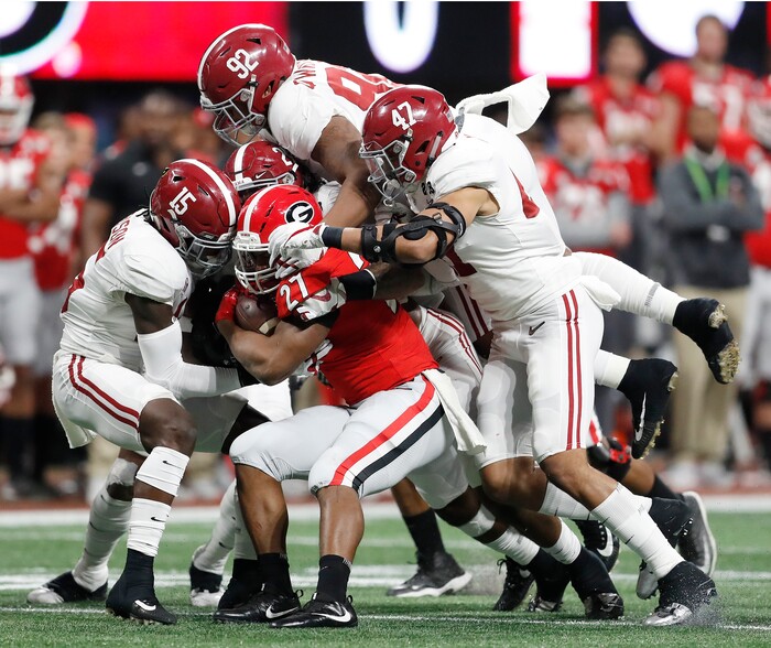 Georgia running back Nick Chubb is stopped during the first half of the NCAA college football playoff championship game against Alabama Monday, Jan. 8, 2018, in Atlanta. (AP Photo/David Goldman)