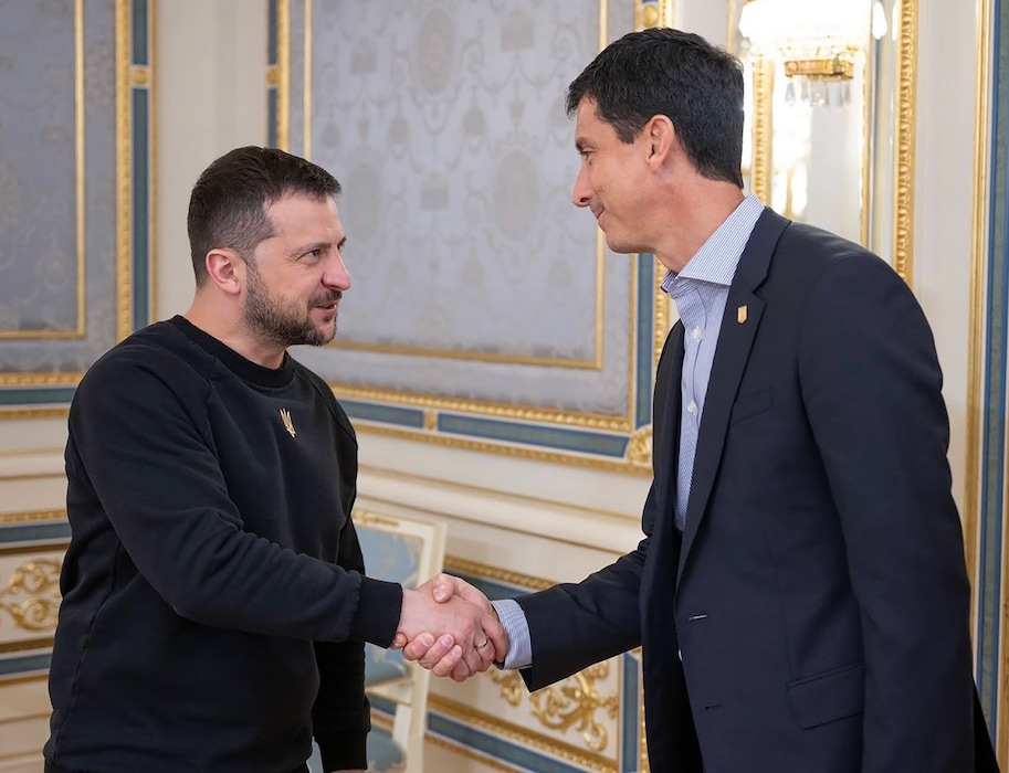 (Ukrainian Presidential Press Office) Ukrainian President Volodymyr Zelenskyy greets Ukraine's honorary consul in Utah Jonathan Freedman at the presidential palace in Kyiv, Ukraine.